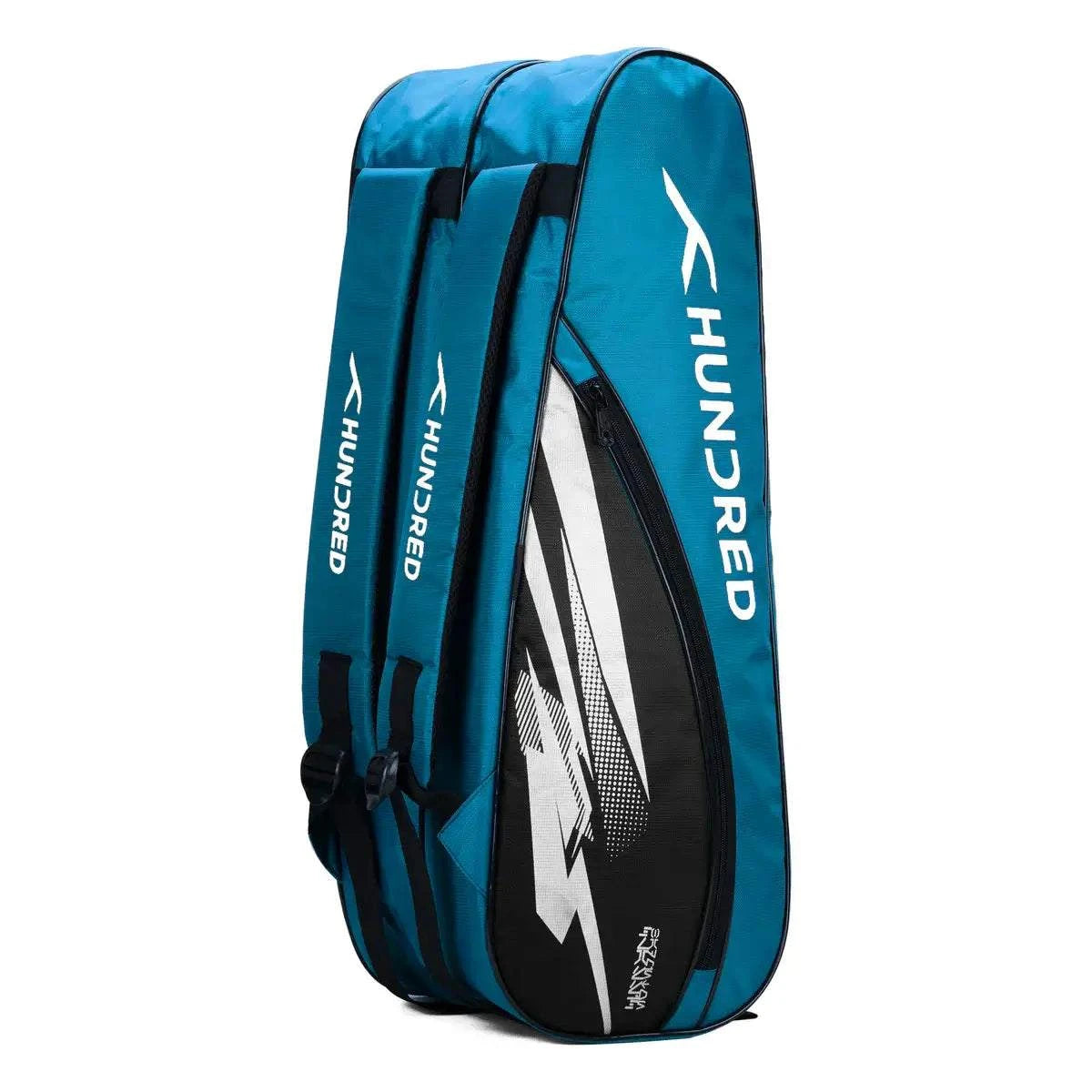HUNDRED Cosmogear Kit Bag in blue and black, with a streamlined racket-shaped design and padded backpack straps