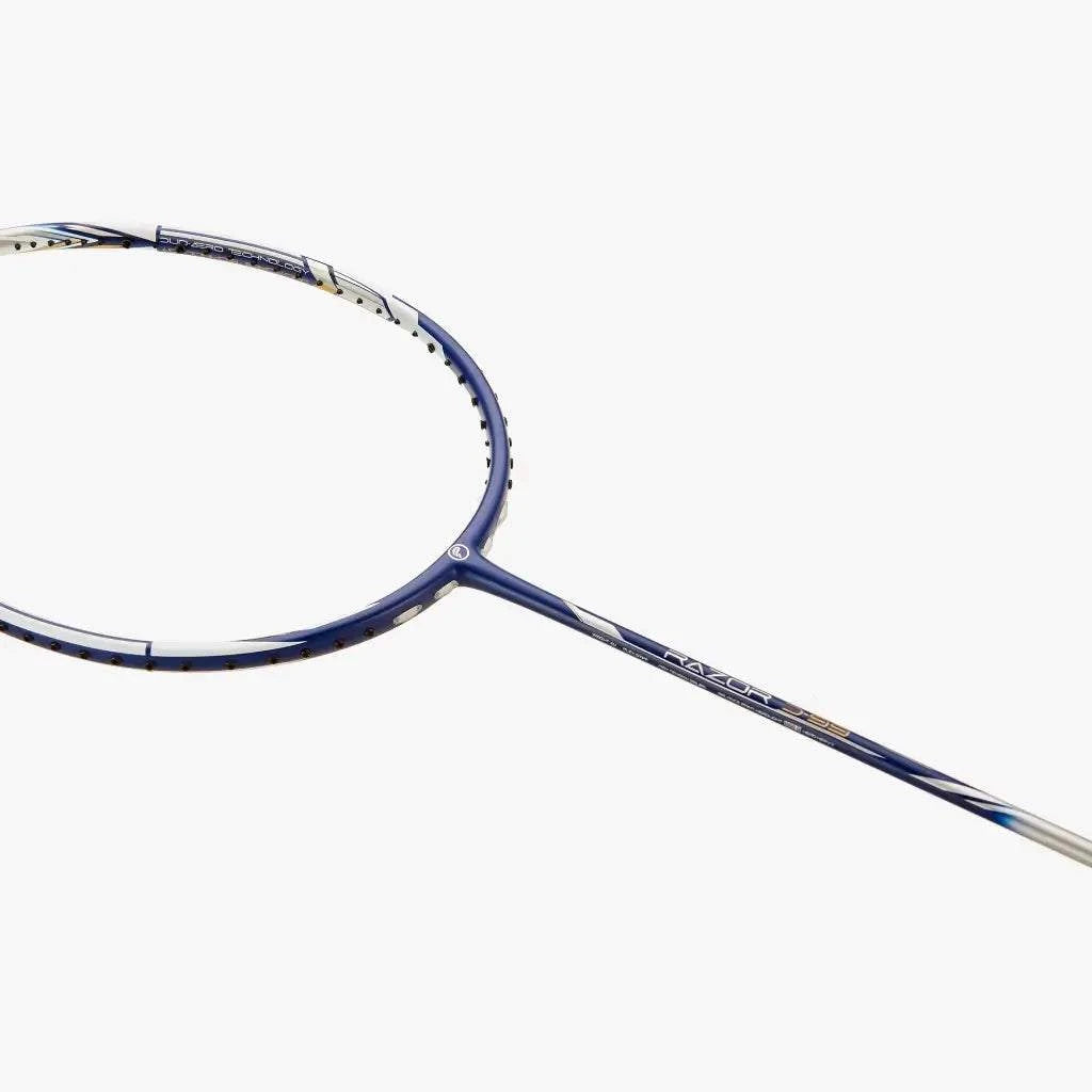 PROTECH RAZOR D-99 badminton racket in dark blue and silver with a slim graphite frame and isometric head