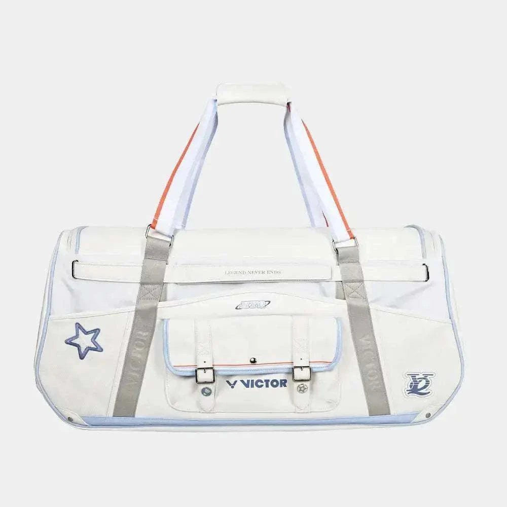 Victor HYQ racket bag in bright white with grey straps, orange-edged handles, front pocket and star emblems