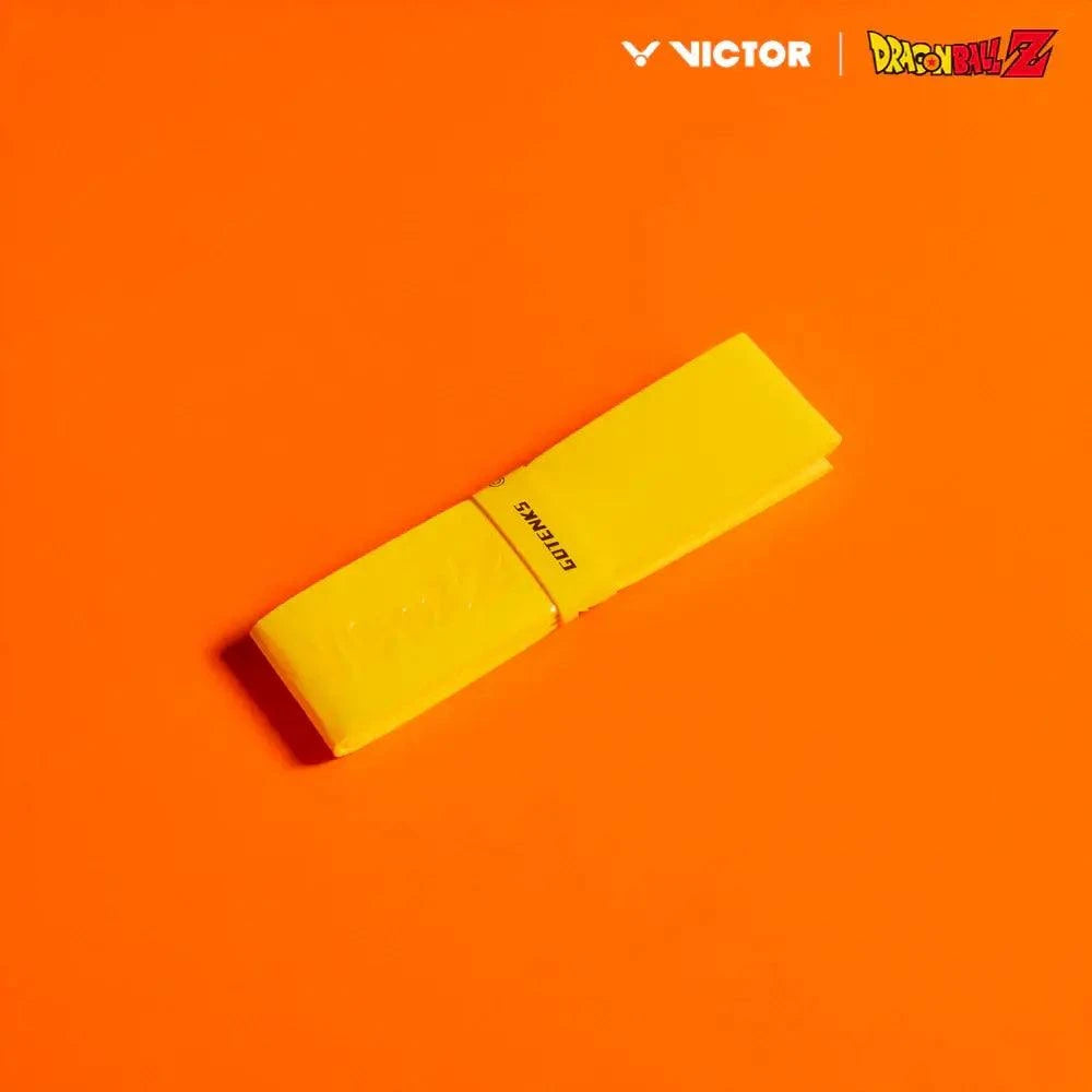 Victor x Dragon Ball Z Grip in vivid neon yellow polyurethane, with a smooth wrap and black branding.