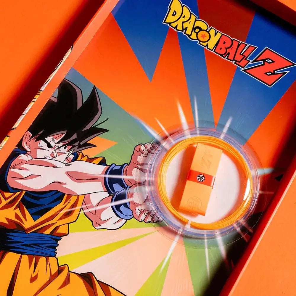 Victor x Dragon Ball Z racket gift box with vivid orange and blue Goku artwork and a circular display window