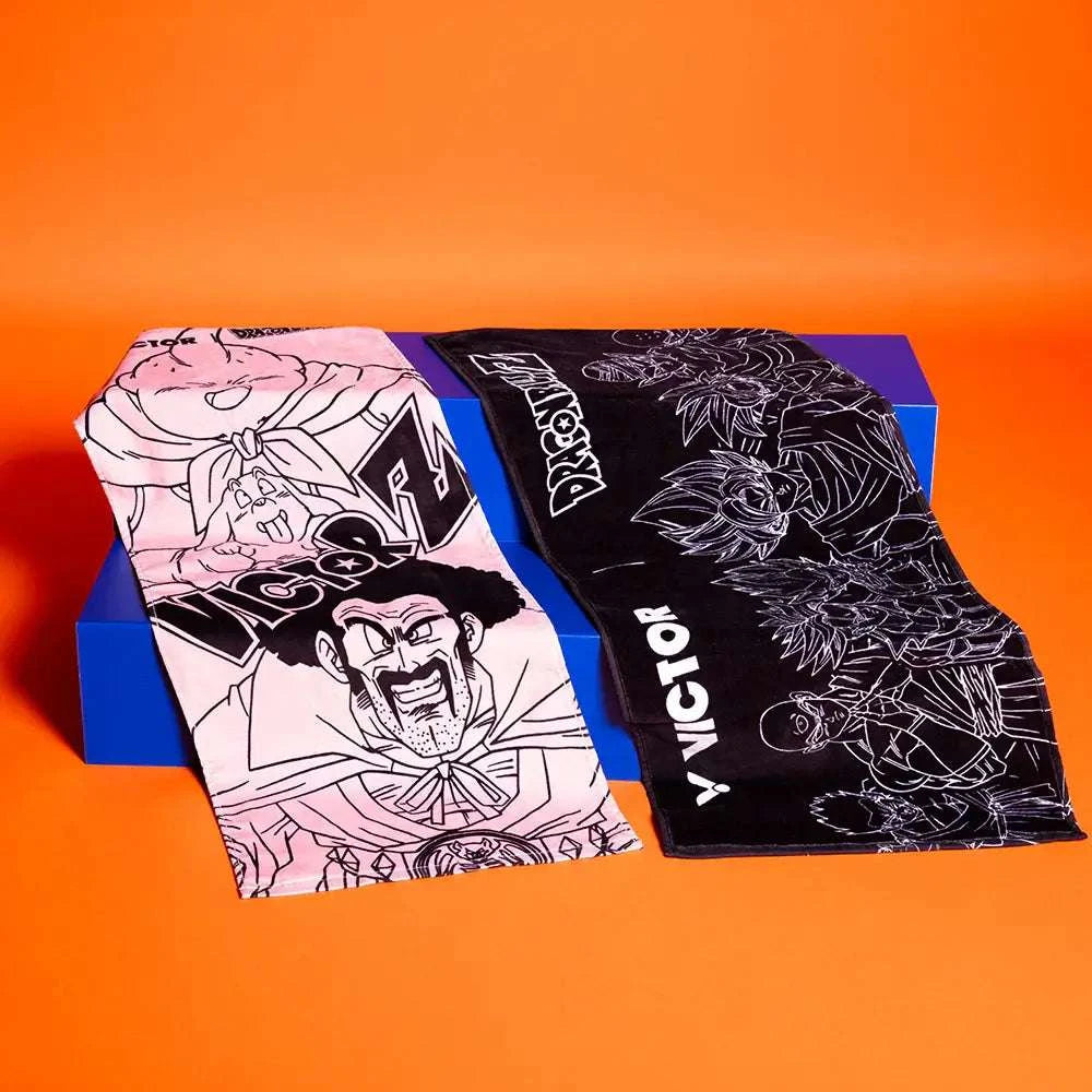 Victor x Dragon Ball Z Towel in black and pink cotton, printed with Dragon Ball Z character artwork and logos