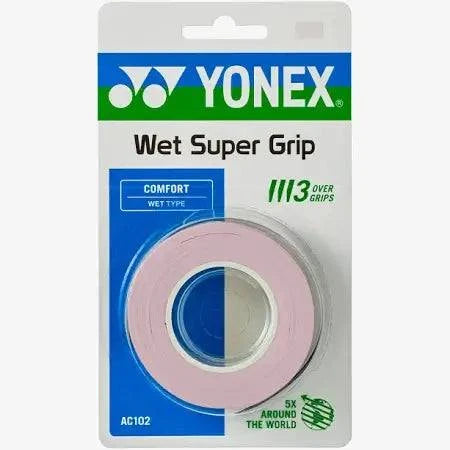 Yonex AC102 Super Grap overgrip in pale pink, with a tacky wet-type finish, shown as a single roll in retail packaging.