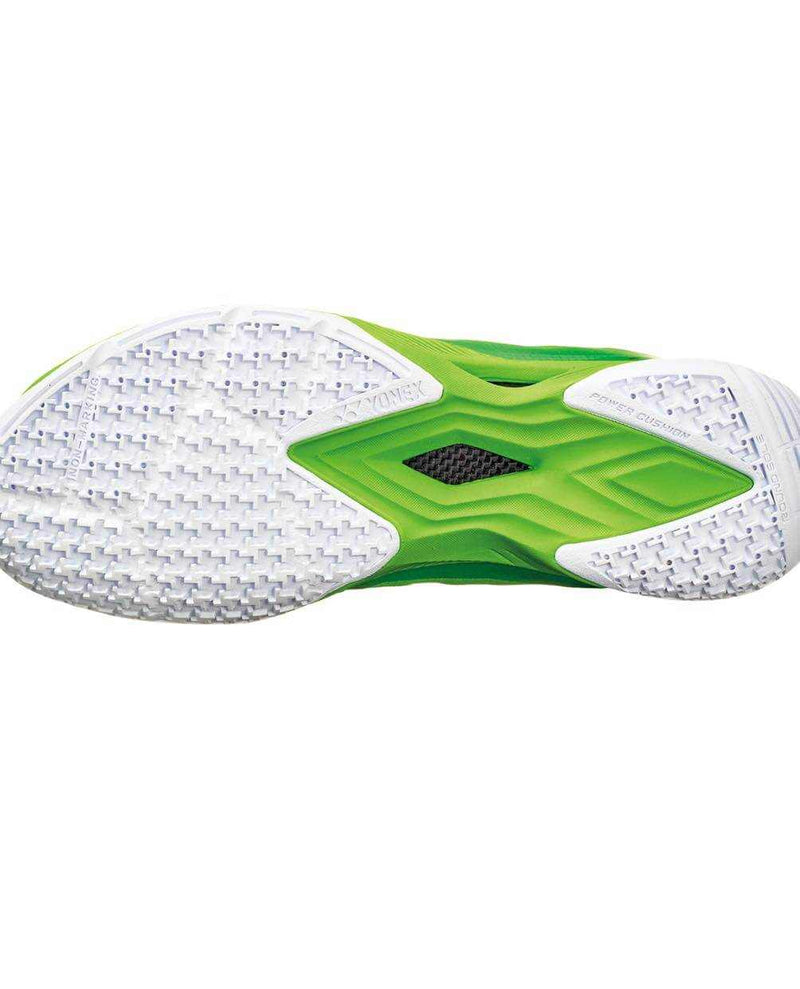 Yonex Aerus Z2 Men badminton shoe outsole in flash green and white, with a textured traction pattern and black midfoot insert