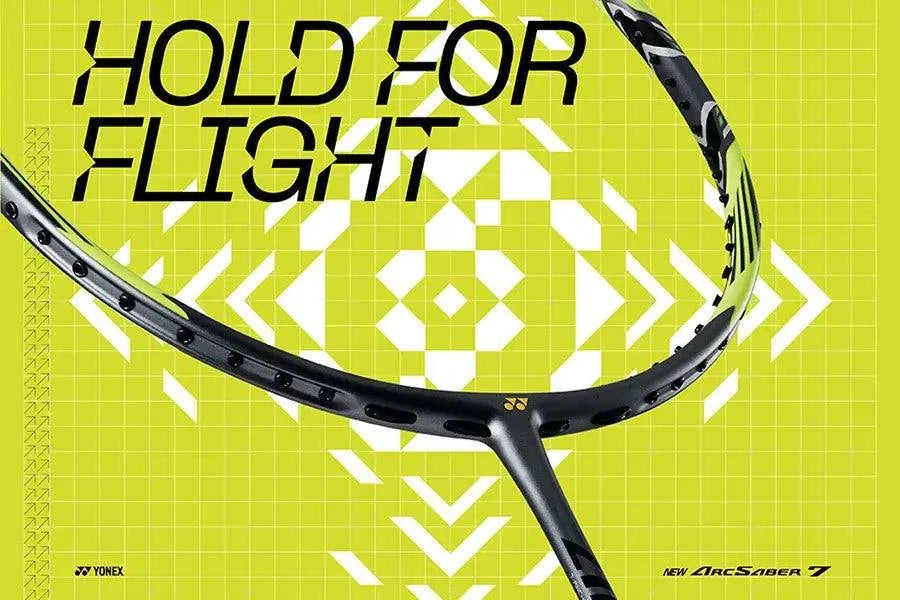Yonex ArcSaber 7 Pro badminton racket with a black frame, gray details and yellow accents in a geometric design