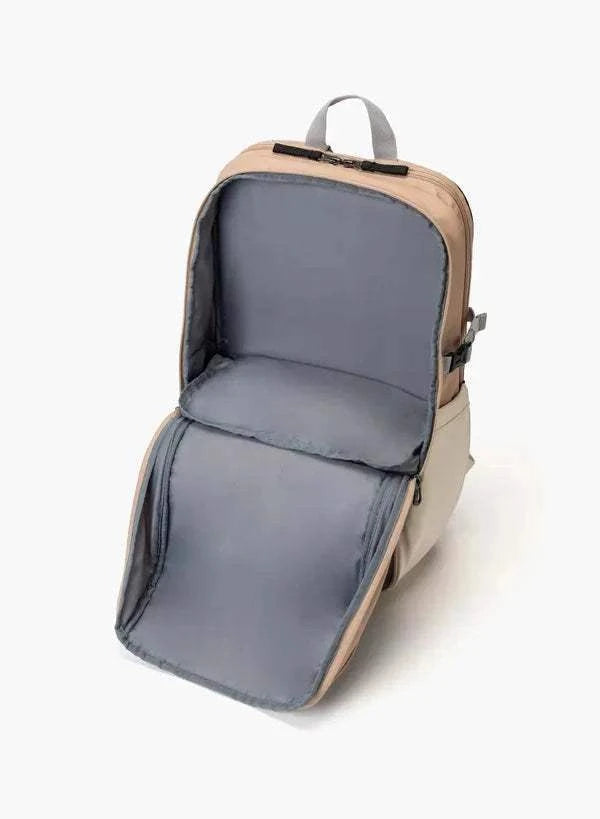 Yonex Club Series badminton backpack in tan and grey with a wide-open main compartment and padded interior