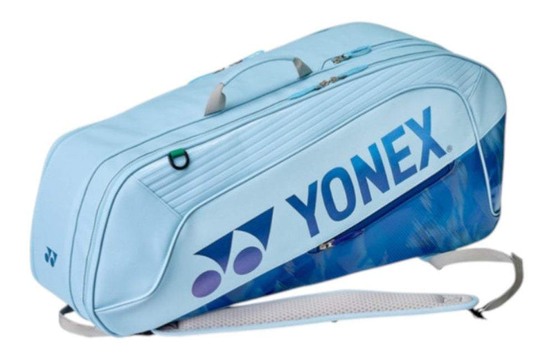 Yonex Expert Series Badminton Racket Bag in light blue polyester with a bold blue logo, zippered compartments and shoulder strap