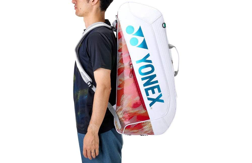 Yonex Expert Series Badminton Racket Bag in white polyester with turquoise logo and red patterned side panel