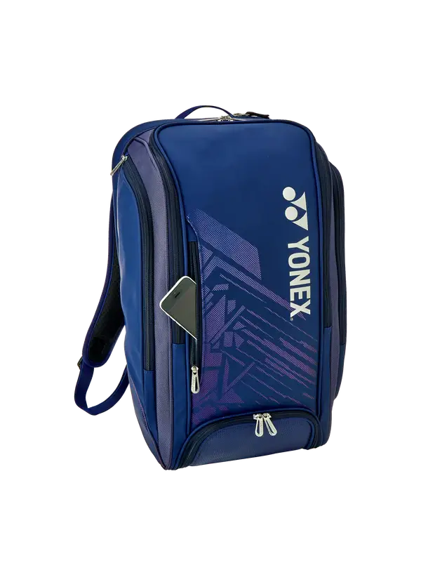 Badminton backpack in navy blue with a purple geometric pattern, vertical Yonex logo and multiple zippered compartments