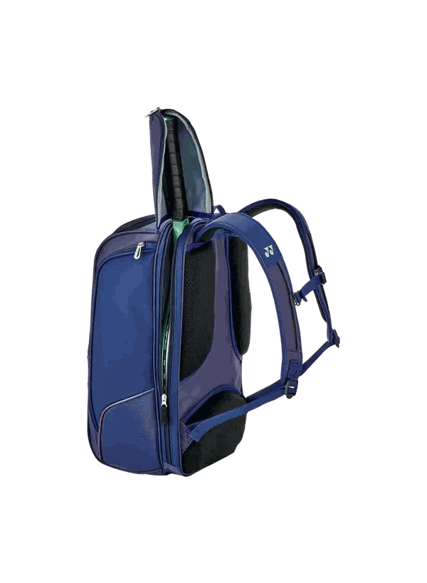 Yonex Expert Series badminton backpack in navy blue with teal trim, multiple zip compartments and padded shoulder straps