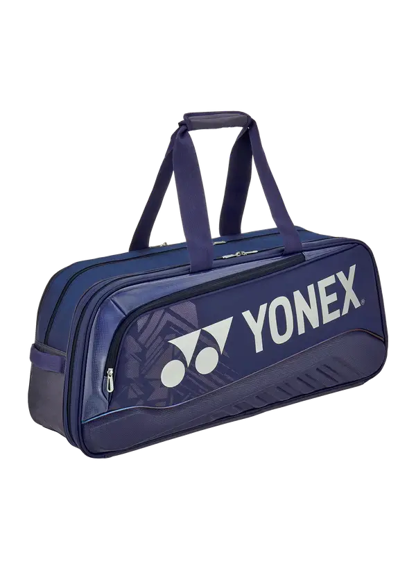 Yonex Expert Series Tournament Badminton Bag in navy with a subtle geometric pattern, white logo, and dual handles