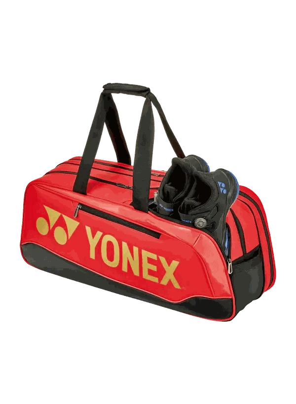 Yonex Expert Series Tournament Badminton Bag in bright red with black trim, large yellow logo, handles and shoe compartment