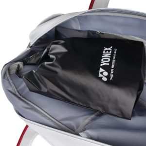 Yonex Expert Series Tournament badminton bag in grey with an open compartment and black Yonex waterproof rain cover