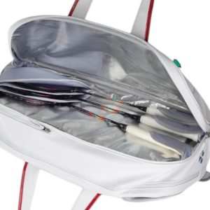 Yonex Expert Series Tournament badminton bag in white with red trim, open to show rackets in a silver-lined compartment