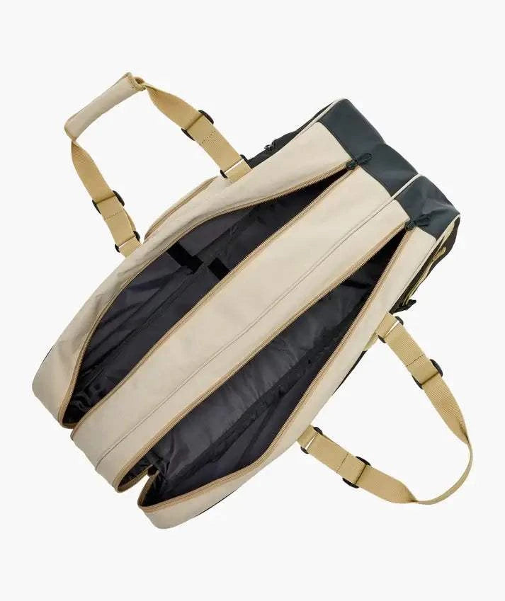 Yonex GEARLOGIC RACQUET BAG in beige with dark green end panels, multiple zip compartments and adjustable straps
