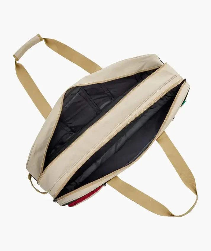 Yonex GEARLOGIC Tournament Bag in light beige with black-lined multiple zip compartments and wide tan shoulder straps