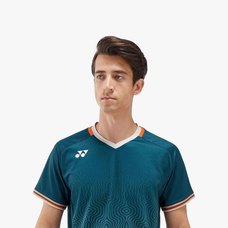 Yonex Men's Crew Neck Shirt in deep teal polyester with tonal wave pattern, white V-neck trim and orange accents