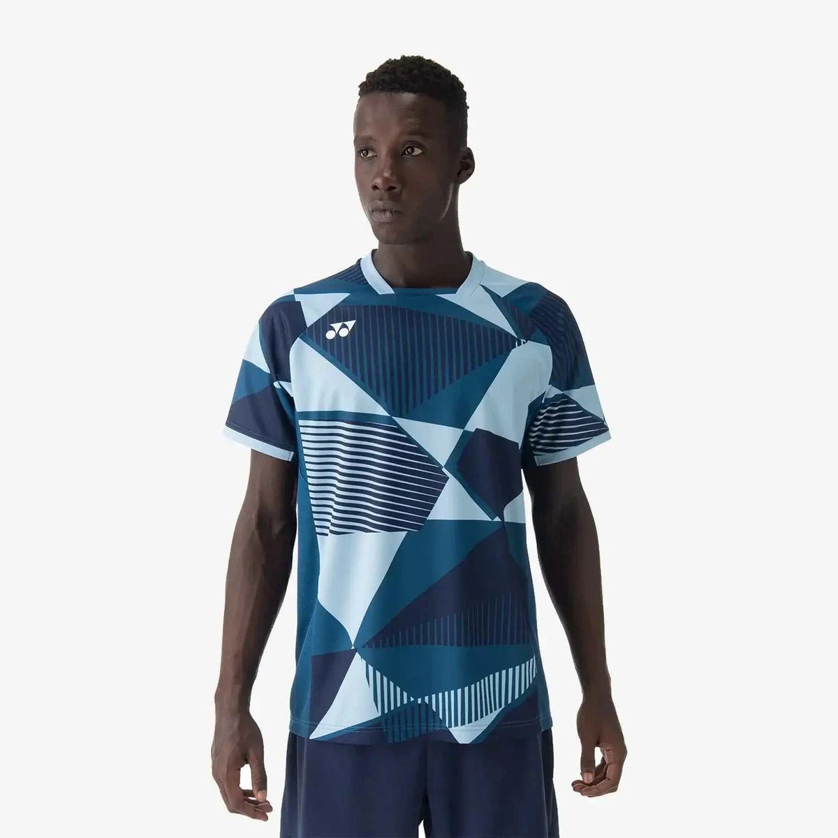 Yonex Men's Crew Neck Shirt in navy and pale blue polyester, with bold geometric panels and striped patterns
