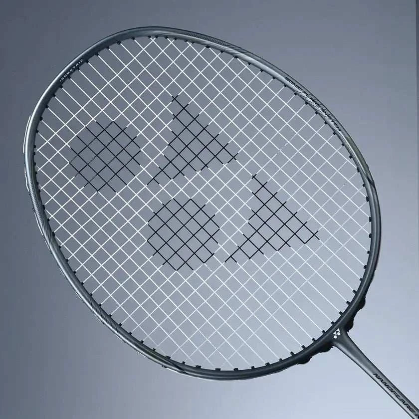 Yonex Nanoflare Nextage Badminton Racket with a dark grey oval frame, white strings and slim shaft
