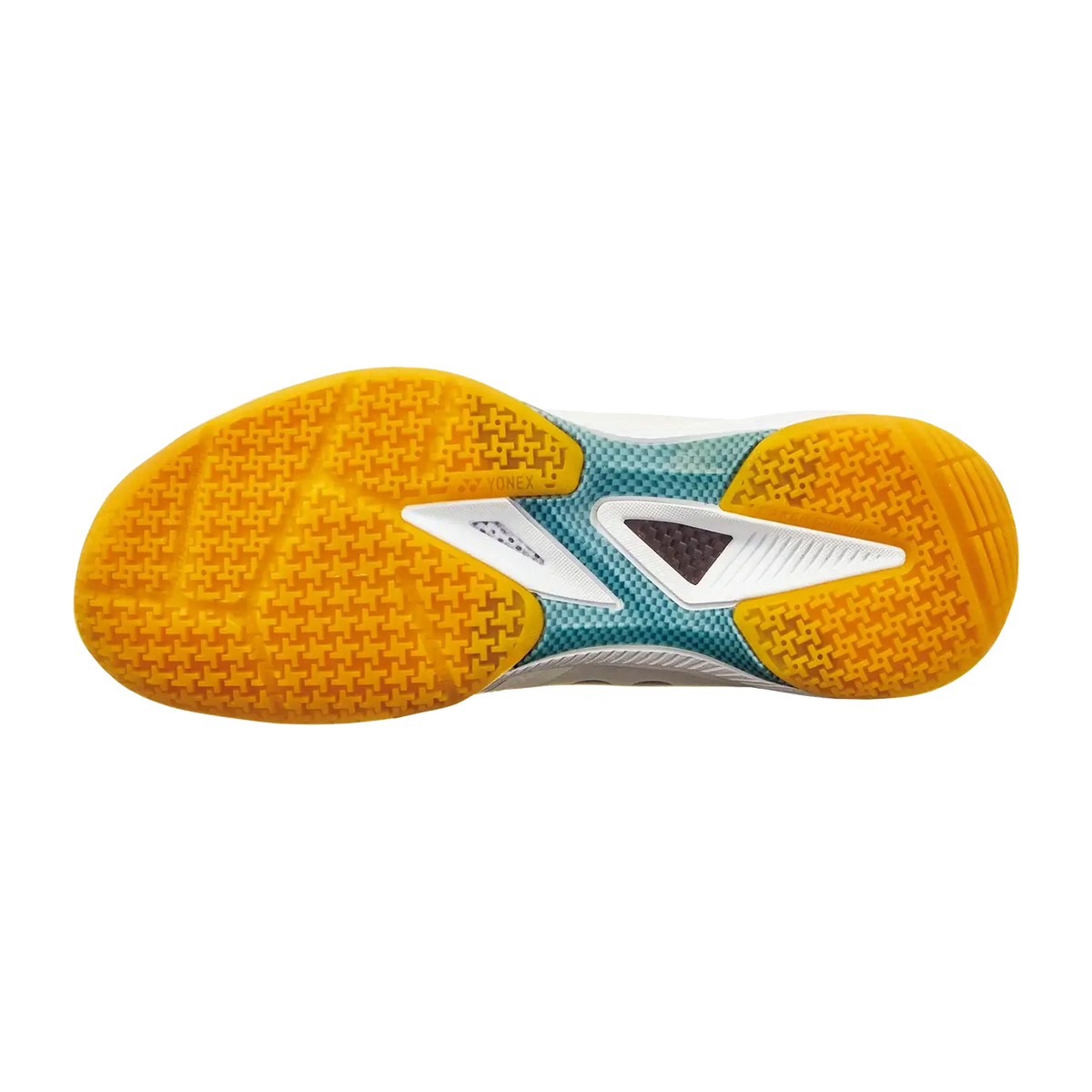 Yonex Power Cushion 65 Z4 badminton shoe outsole with bright orange textured rubber grip, teal and white midsole accents