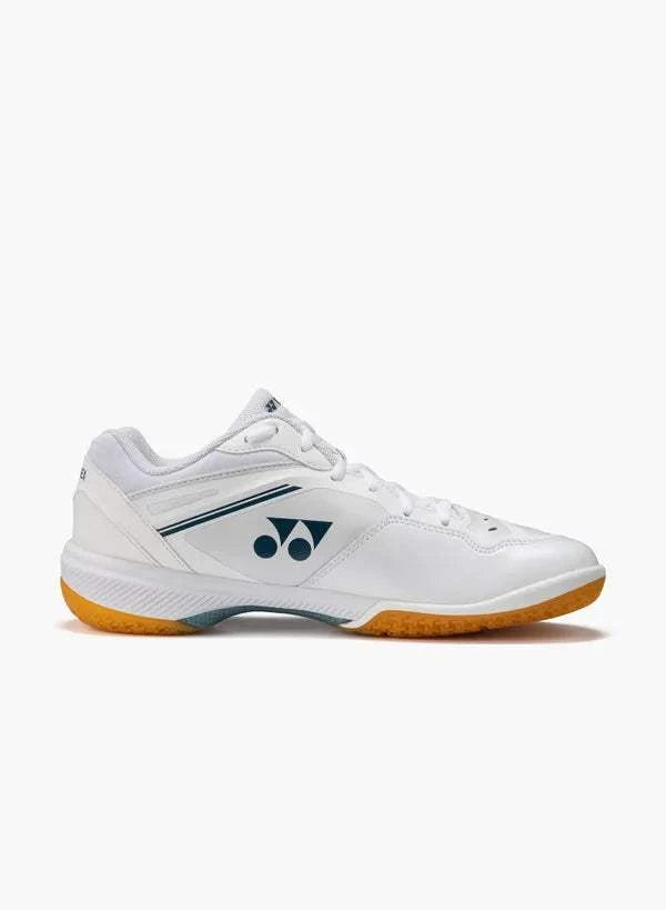 Yonex Power Cushion 65 Z4 Slim badminton shoe in white synthetic leather with teal accents and an orange rubber outsole