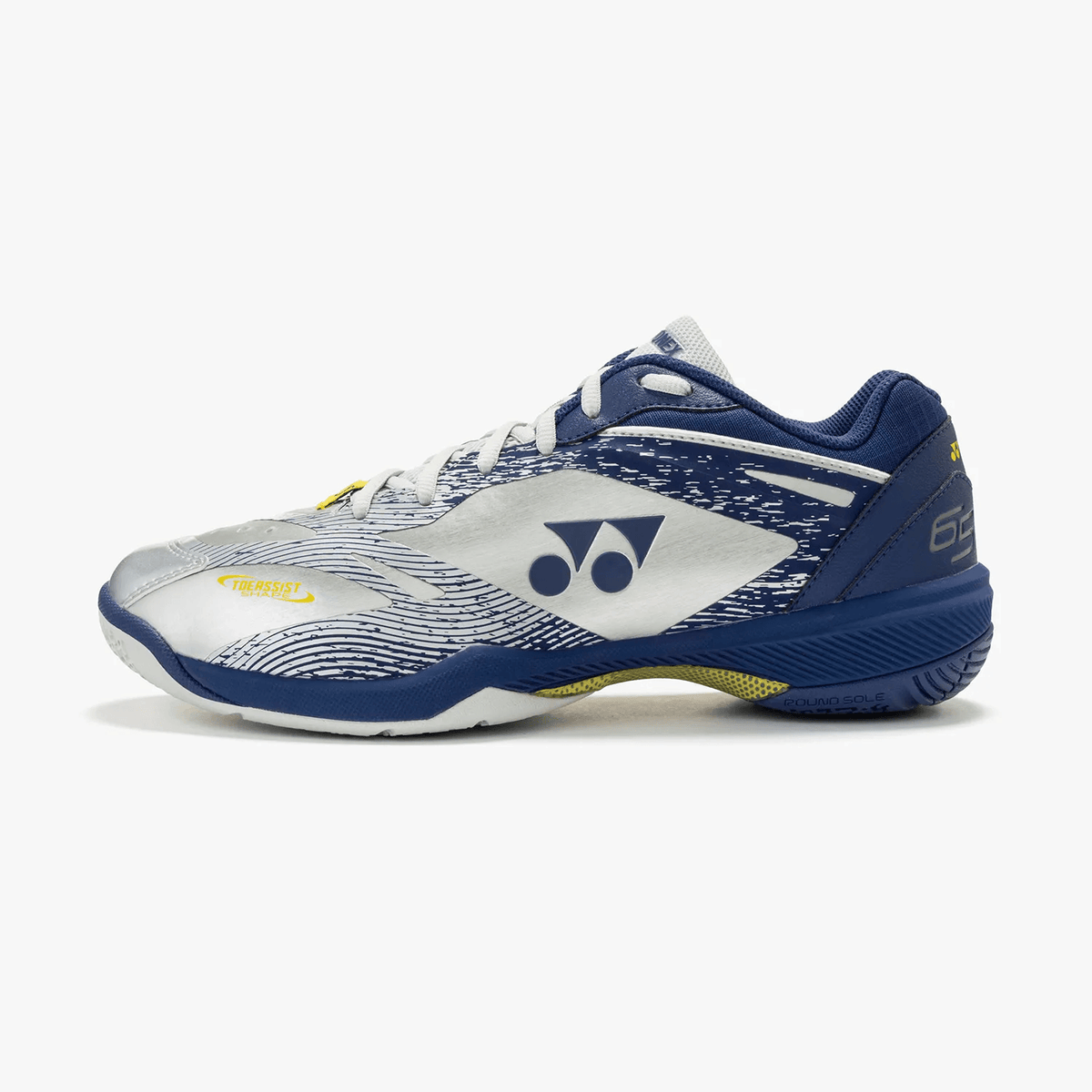 Yonex Power Cushion 65 Z4 Wide badminton shoe in silver and navy with patterned mesh panels and yellow accents