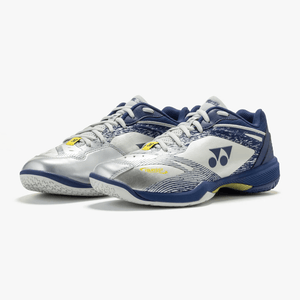 Yonex Power Cushion 65 Z4 Wide badminton shoes in silver and navy synthetic leather with patterned panels and rubber soles