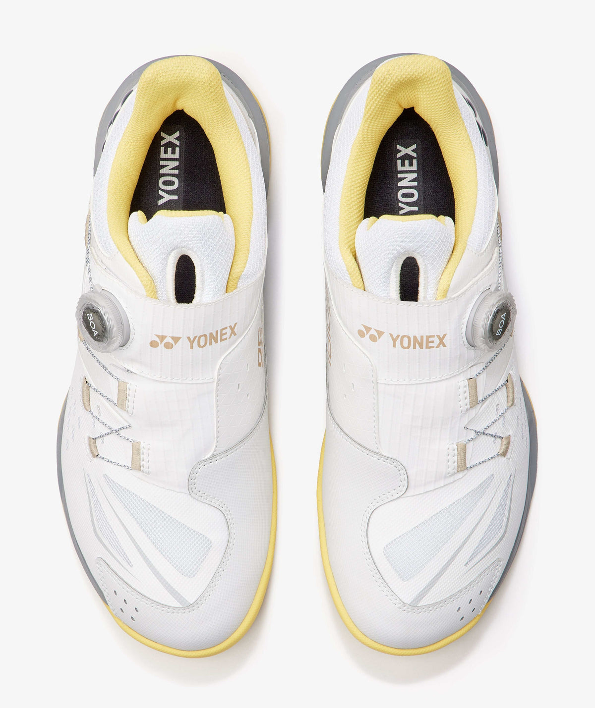 Yonex Power Cushion 88 Dial 3 badminton shoes in white synthetic material with warm yellow lining, silver accents and rotary dials