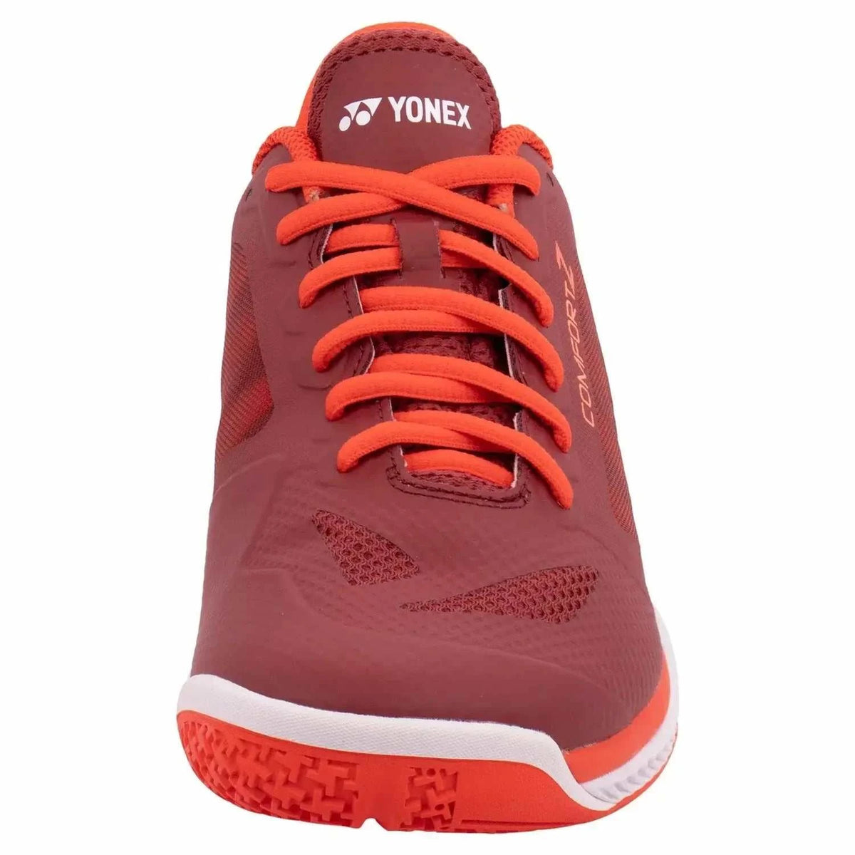 Yonex Power Cushion Comfort Z3 badminton shoe in dark red with orange laces, textured synthetic upper and patterned rubber sole
