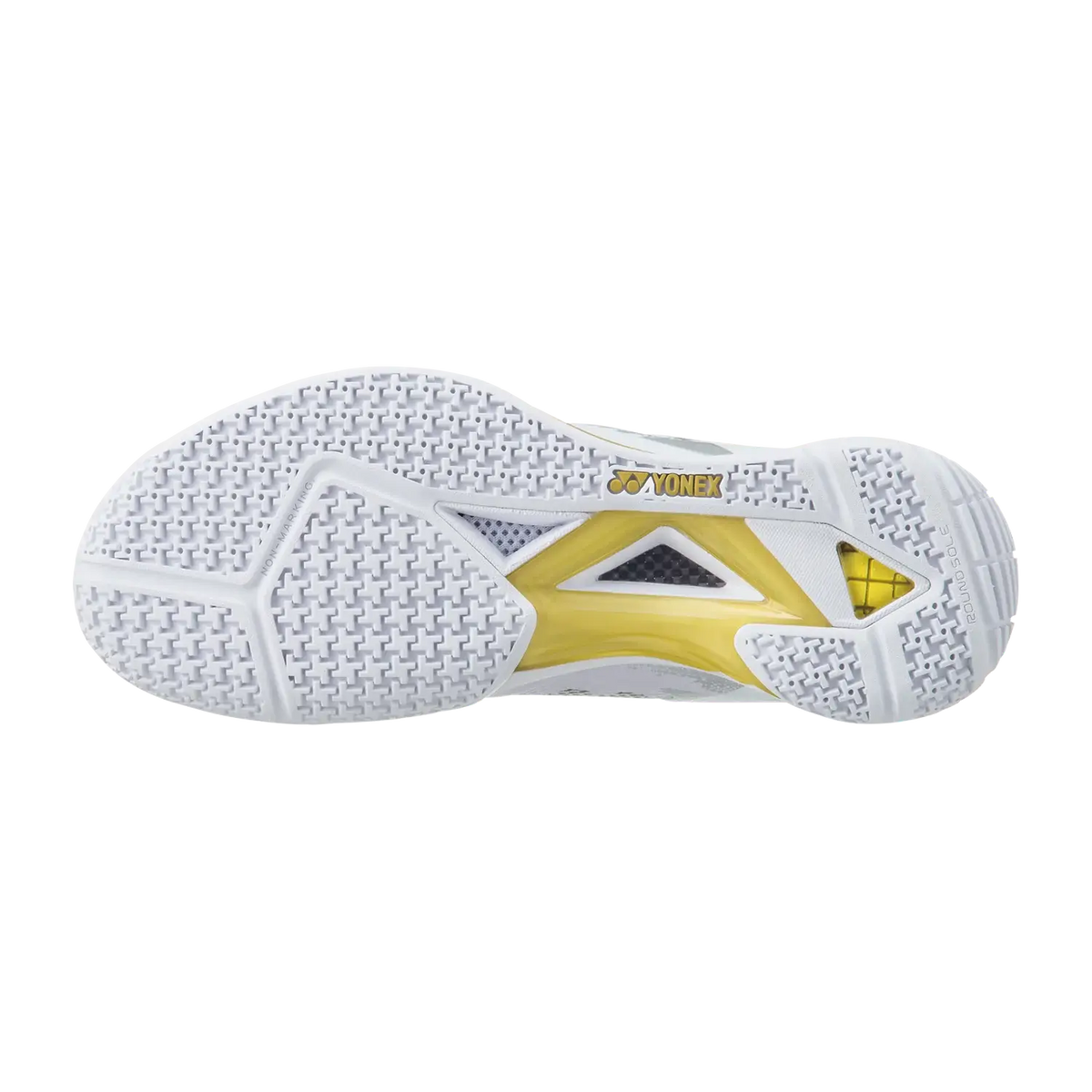 Yonex Power Cushion Eclipsion Z3 badminton shoe outsole in white and gold, featuring a textured traction pattern and yellow support insert