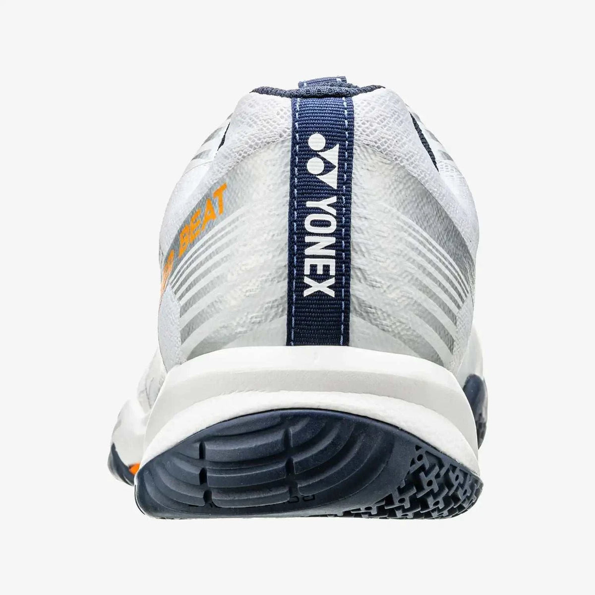 Yonex Strider Beat Power Cushion badminton shoe in white synthetic mesh with gray accents, orange lettering and a navy heel tab