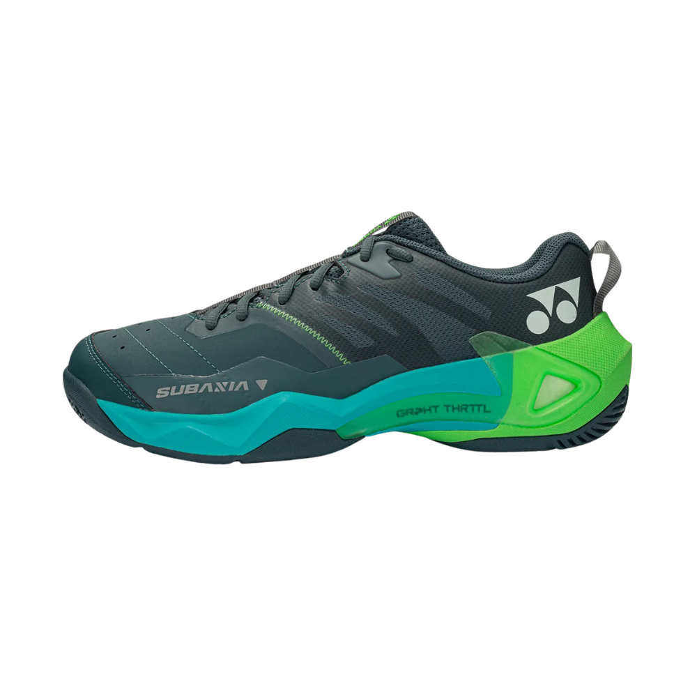 Yonex Subaxia GT badminton shoe in dark charcoal with a teal and bright green sole, lightweight mesh upper and wide fit