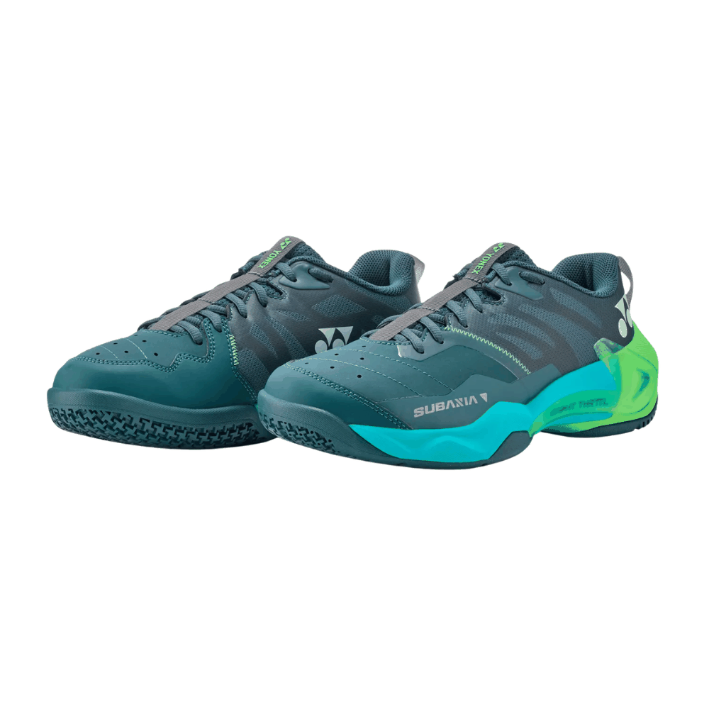 Yonex Subaxia GT badminton shoes in dark teal with gray patterned uppers, turquoise midsole accents and bright green heels
