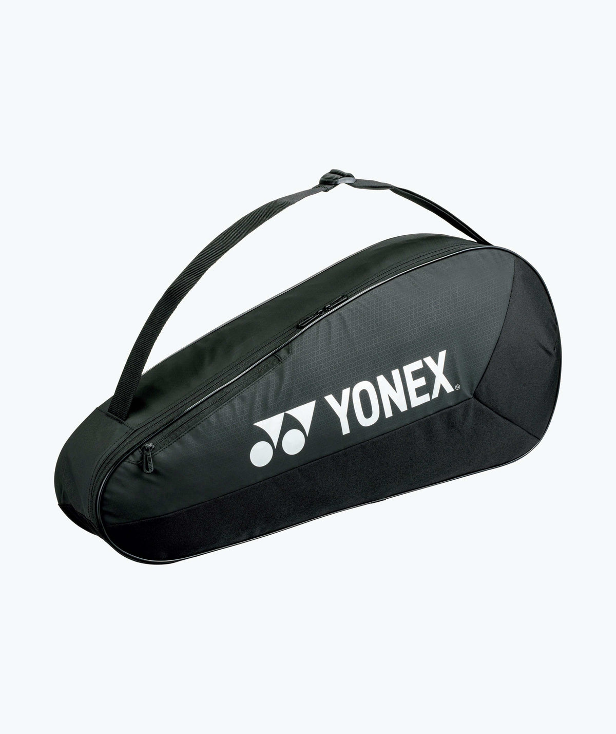 Yonex Team Series badminton bag in black textured fabric with white logo, zippered compartment and shoulder strap