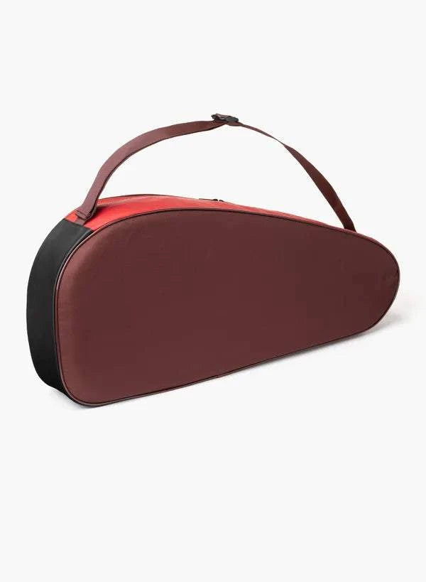 Yonex Team Series badminton bag in burgundy with black side panel, red trim and an adjustable shoulder strap