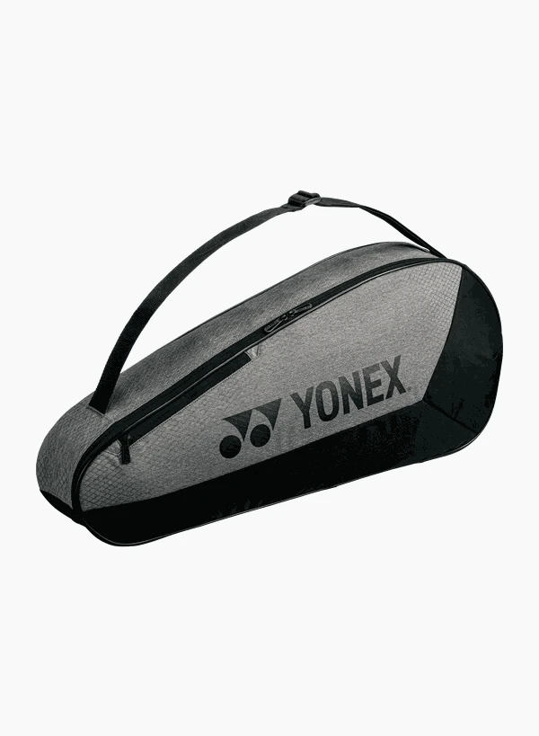Yonex Team Series badminton bag in grey and black textured fabric with a shoulder strap, zip closure and bold logo