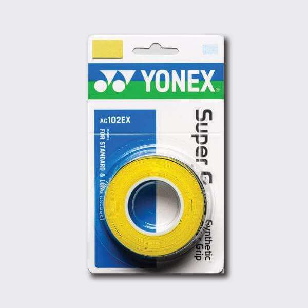 Yonex AC102 Super Grap yellow polyurethane overgrip, tightly wound in retail packaging with a tacky synthetic grip design
