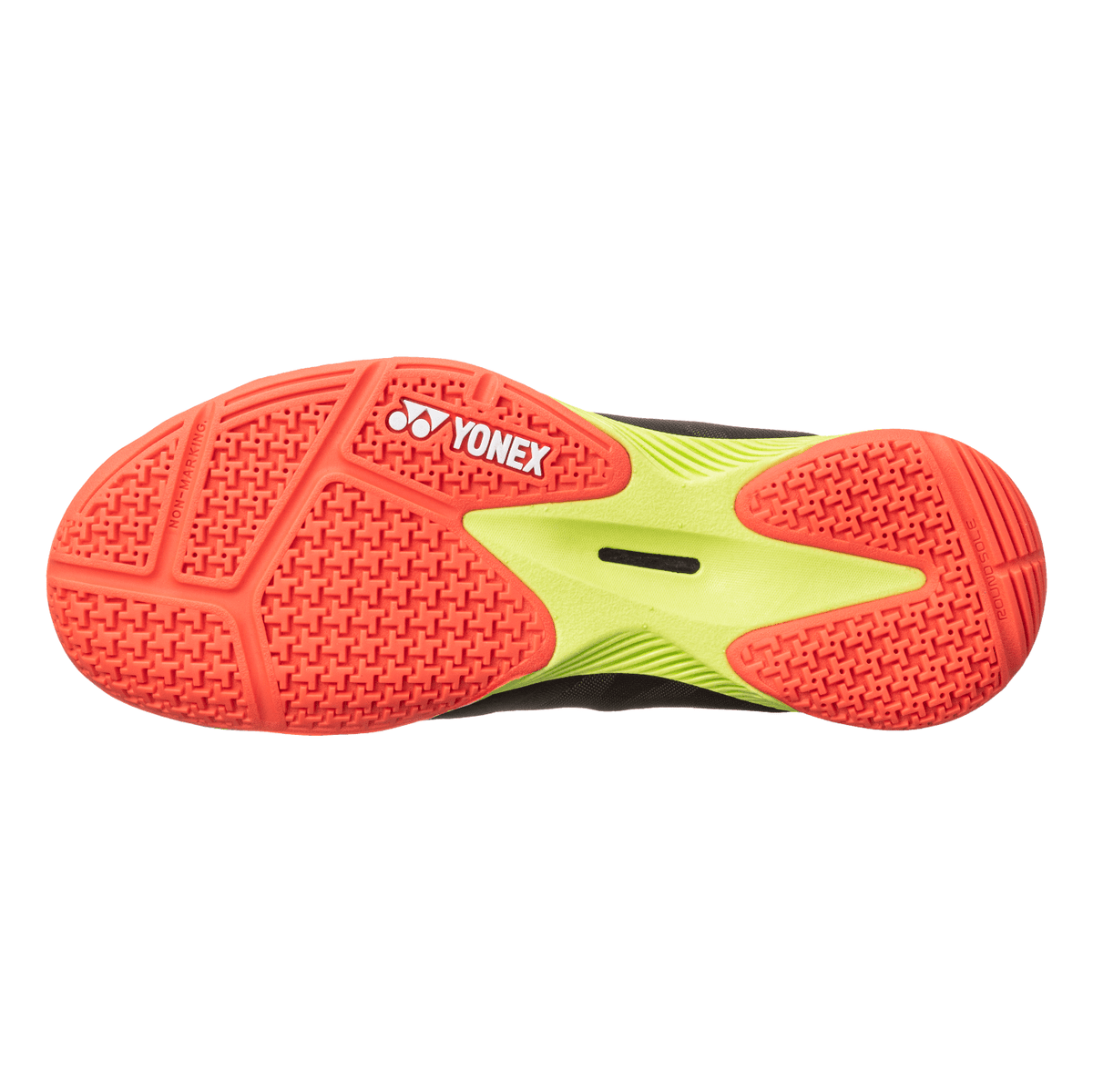 Yonex Power Cushion Comfort Z3 badminton shoe outsole in coral red rubber with lime-green centre and radial traction pattern