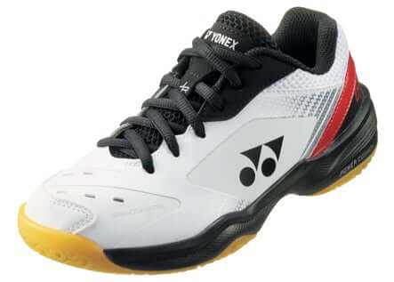 Yonex Power Cushion SHB-65 Junior badminton shoe in white with black laces, mesh panels, red accents and yellow outsole